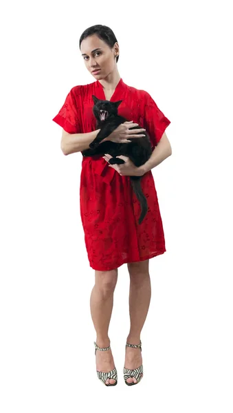 Girl in red dressing gown with kitten — Stock Photo, Image