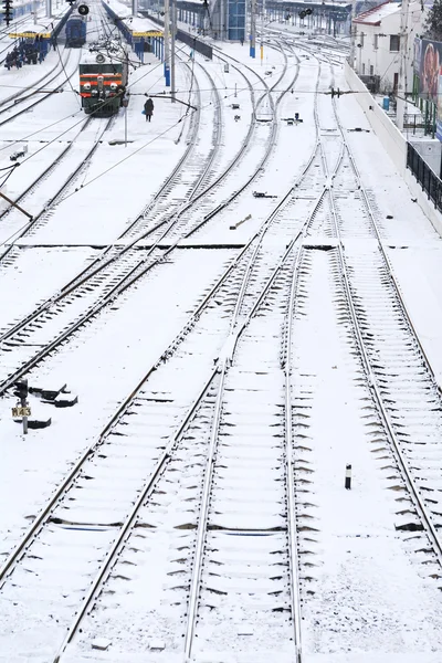 Bakgrund av järnvägslinjer i vinter — Stockfoto