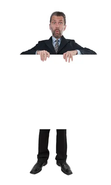 Άνθρωπος στην επιχείρηση κοστούμι δείχνει σε πινακίδα — Φωτογραφία Αρχείου