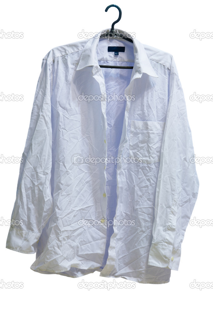 wrinkled male white laundered shirt on hanger