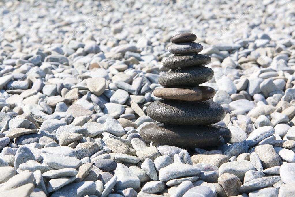 Pyramid of pebbles on the beach