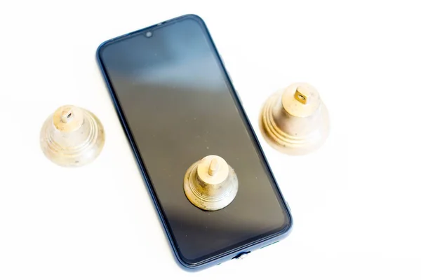 Copper Bell Top Cell Phone — стоковое фото