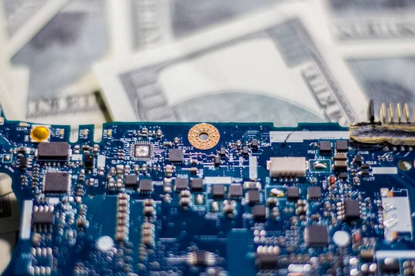 Motherboard on banknotes. Increasing the cost of electronics