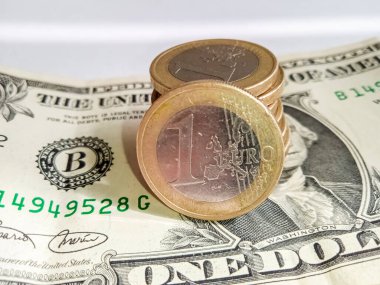 Coins and banknotes close-up. Changes in the exchange rate due to the war in Ukraine