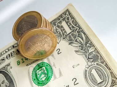 Coins and banknotes close-up. Changes in the exchange rate due to the war in Ukraine