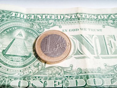 Coins and banknotes close-up. Changes in the exchange rate due to the war in Ukraine