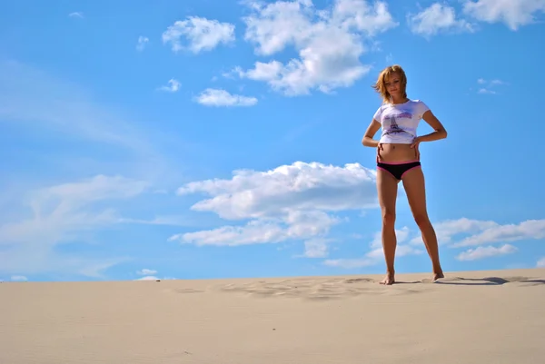 Sexy beautiful female model sits and poses in panties alone in the desert — Stock Photo, Image