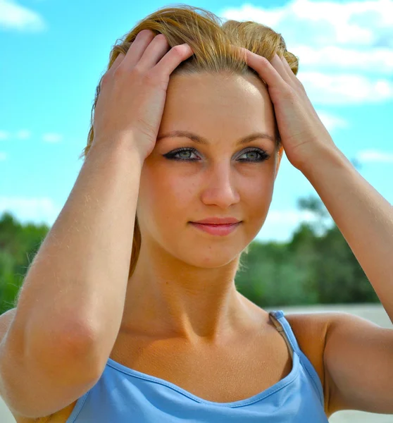 Pretty sexy girl touches her face — Stock Photo, Image