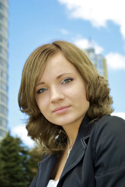 Portrait of a nice girl with a curly hair — Stock Photo, Image