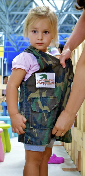 Cute little girl in camouflage — Stock Photo, Image