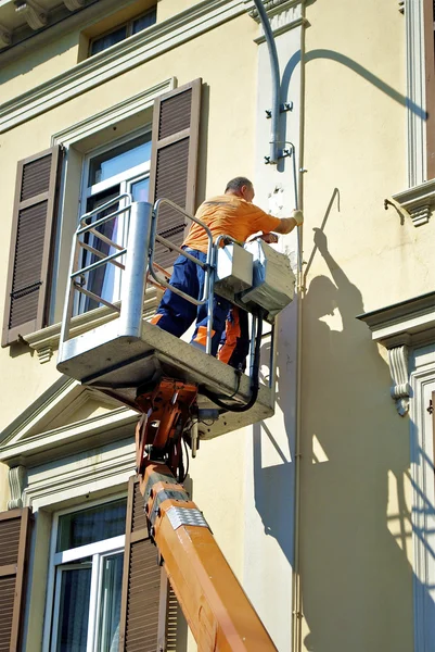 Mann auf dem Bagger — Stockfoto