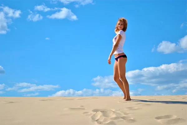 Girl on the sand — Stock Photo, Image