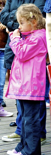 Little girl in the pick jacket — Stock Photo, Image