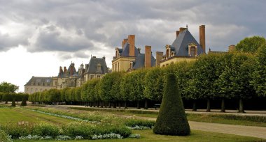 Panoramic view of the Castle Fontainebleau and its garden clipart