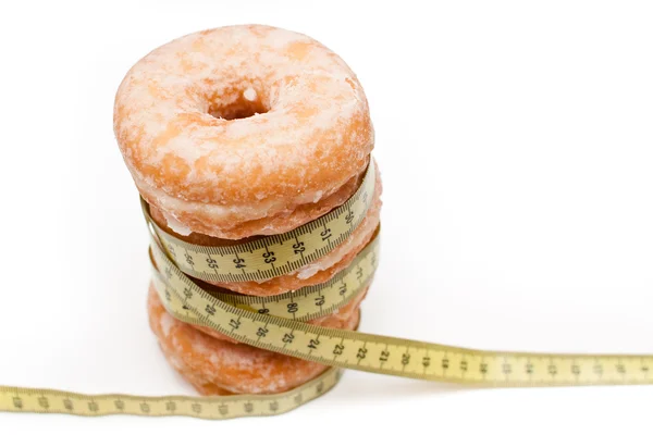 Donuts con una cinta métrica — Fotografia de Stock