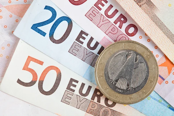 Euro notes and coins — Stock Photo, Image