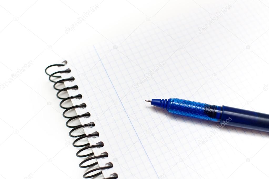 Blue pen on a notebook