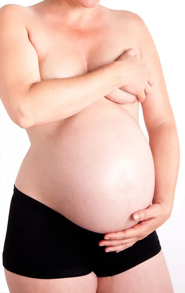 Donna incinta che si tocca la pancia — Foto Stock