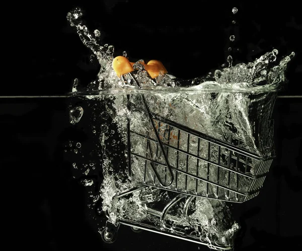 Shopping Cart Plunging Water Isolated Black Background — Foto Stock