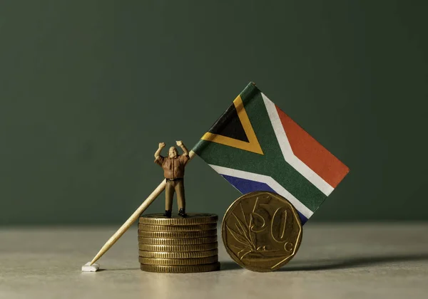 Miniature Man Stack Coins South African Flag — Stock Photo, Image