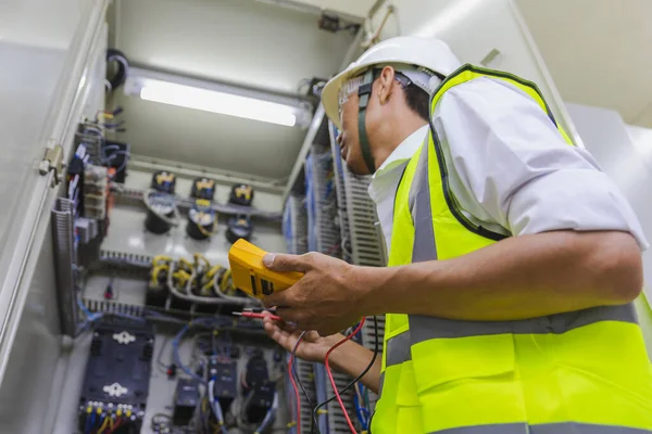 Electrician Installing Electric Cable Wires Fuse Switch Box Multimeter Hands — Fotografia de Stock