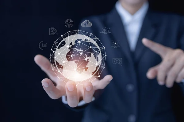 Businessman holding globe, Accessing the Technology Internet, multimedia, Storage Network connection Concept And a large database big data Through internet technology.