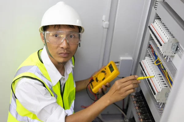 Male Engineer Checking Electrical System Electronic Equipment Royalty Free Stock Images