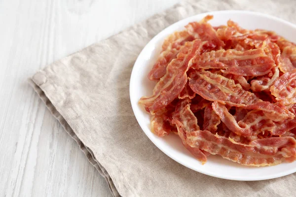 Crispy Fried Bacon White Plate Side View Space Text — Stock Photo, Image