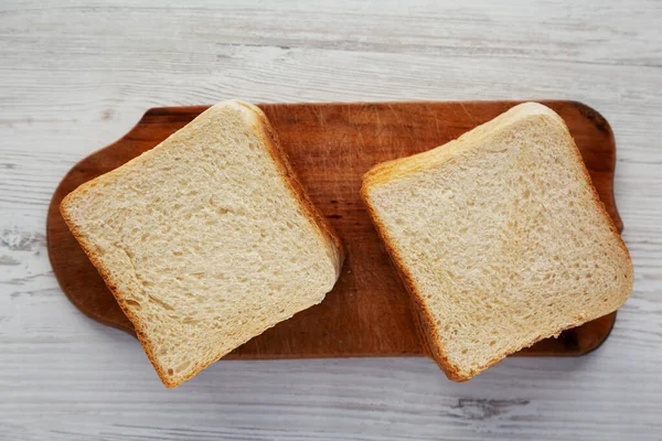 Beyaz Ekmek Dilimleri Rustik Tahta Üzerinde Üst Manzara Dümdüz Tepeden — Stok fotoğraf