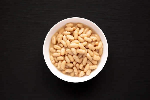 Organic White Cannellini Beans White Bowl Top View Flat Lay — Zdjęcie stockowe