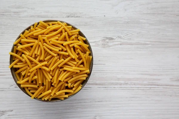 Dry Organic Maccheroni Pasta Bowl White Wooden Surface Top View — Stock Fotó