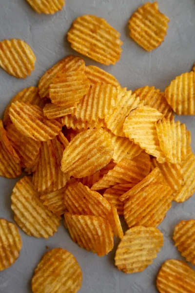 Crispy Barbeque Potato Chips Gray Surface Top View Flat Lay — Stockfoto