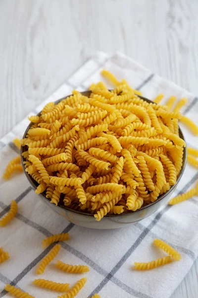 Uncooked Dry Girandole Torsades Pasta Bowl Side View Close — Stock Photo, Image