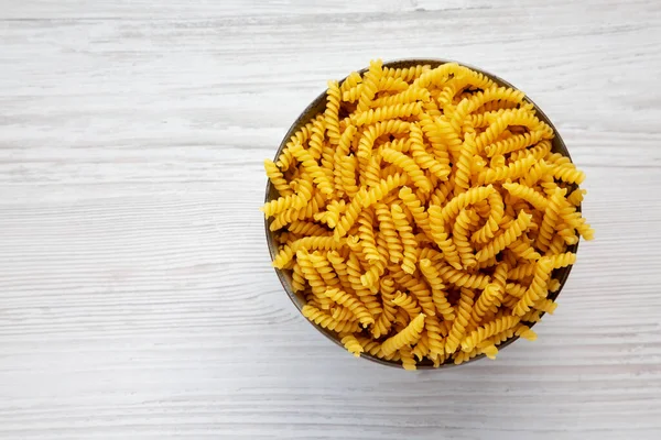 Uncooked Dry Girandole Torsades Pasta Bowl Top View Flat Lay — Stockfoto