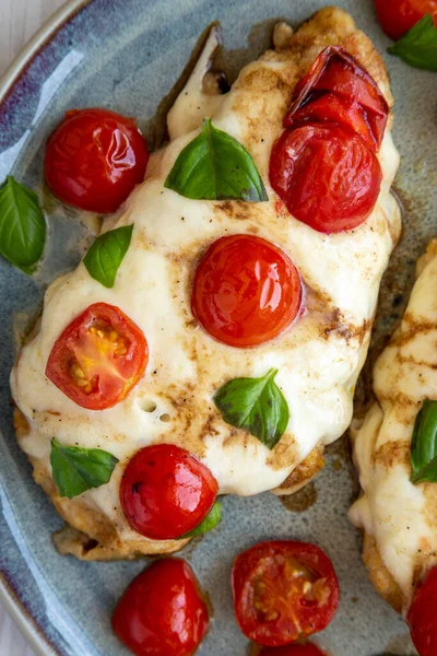 Homemade Caprese Chicken Parmesan Tomato Mozzarella Basil Plate Top View — Stok fotoğraf