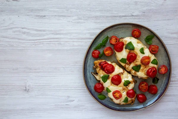 Homemade Caprese Chicken Parmesan Tomato Mozzarella Basil Plate Top View — Stok fotoğraf