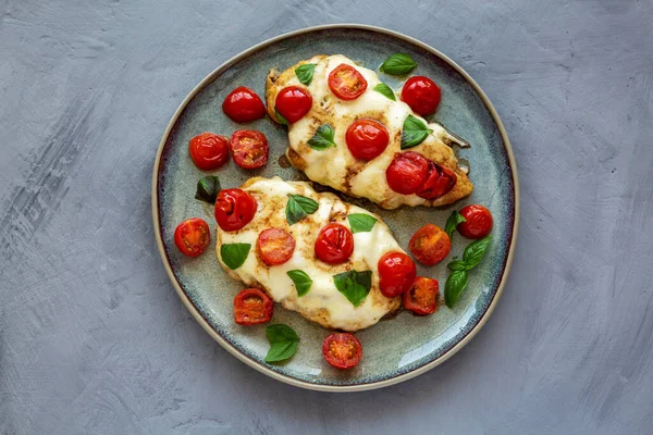 Homemade Caprese Chicken Parmesan Tomato Mozzarella Basil Plate Top View — Stok fotoğraf