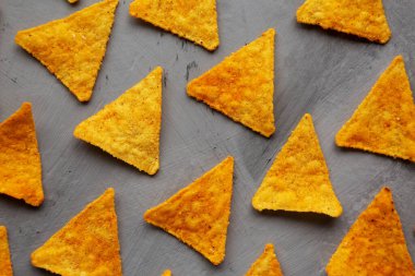 Gluten free Mexican tortilla chips with Barbecue Flavor on a gray background, top view