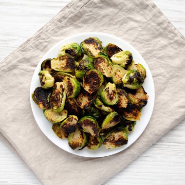 Homemade Roasted Brussel Sprouts on a Plate, top view. Flat lay, overhead, from above.