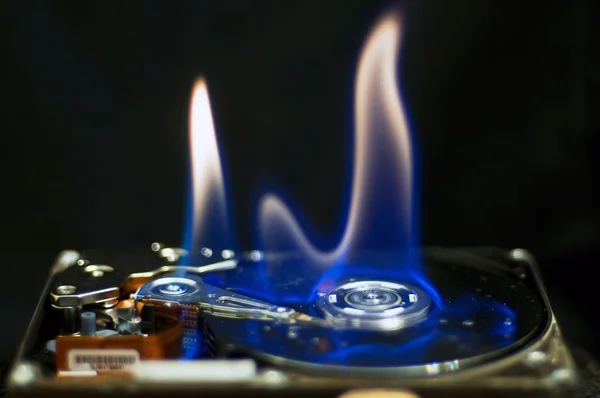 Burning hard disk drive — Stock Photo, Image