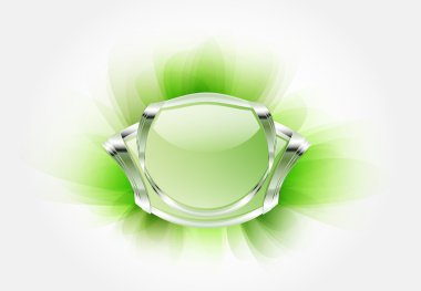 Rosa placa metálica con cristal sobre fondo verde suave.