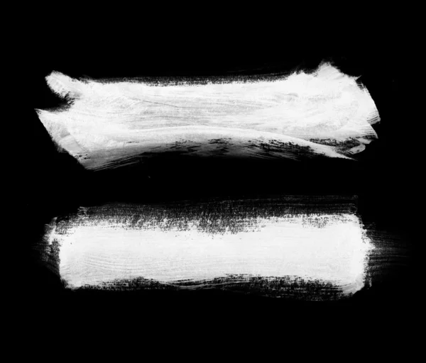Beyaz el fırça darbeleri siyah boyalı — Stok fotoğraf