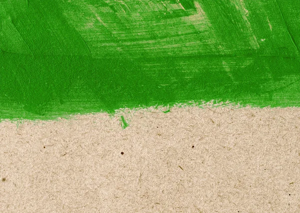 Green hand-painted brush stroke daub background over old vintage paper — Stock Photo, Image