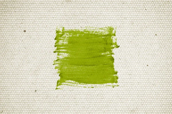 绿色抽象手绘笔刷笔触涂抹在老式旧纸 — 图库照片