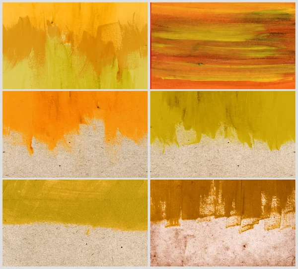 A set of hand painted yellow backgrounds daubs and brush strokes — Stock Photo, Image