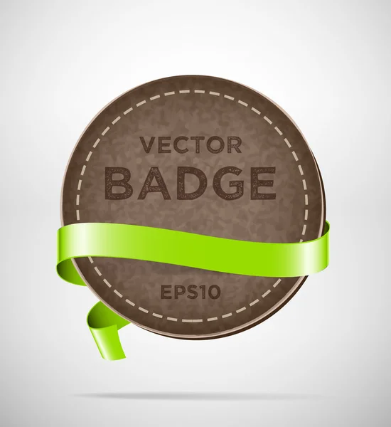 Vector round vintage leather badge with green silky ribbon — ストックベクタ