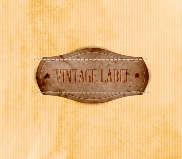 Etiqueta de etiqueta vintage sobre fondo de papel viejo — Vector de stock