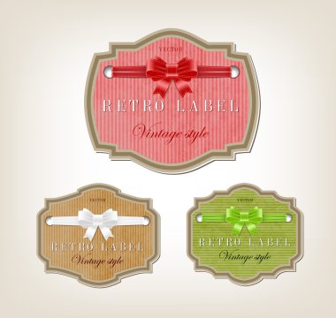 Üç şenlikli ipeksi yay knot ile ayarla vintage tarzı karton etiketler vektör