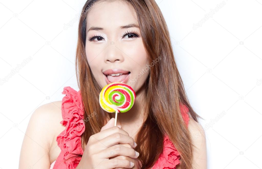 Cute girl with lollipop