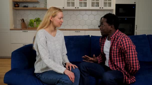 African American man boyfriend gives gift box girlfriend caucasian woman, couple — Stock Video